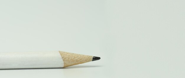 Pencil on a white background and place for text Writing text.