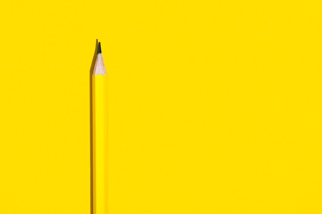 Pencil on a yellow background