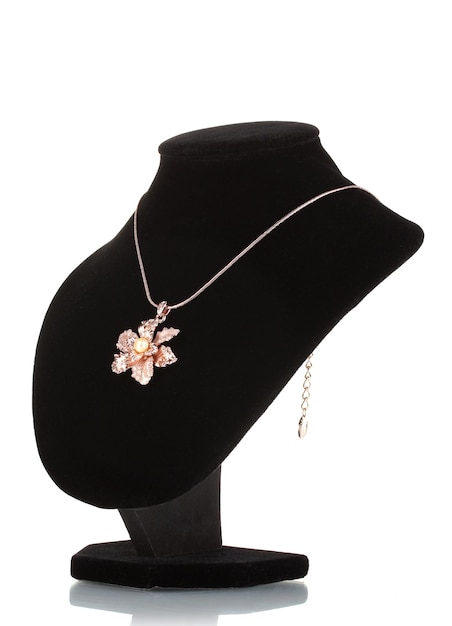 Pendant in form of flower on mannequin isolated on white