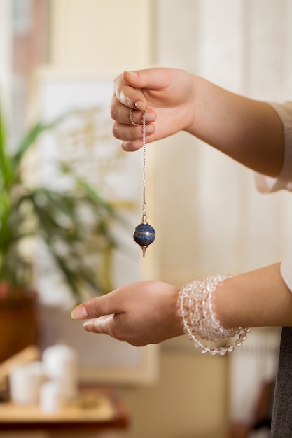 Pendulum in the hands of a healer