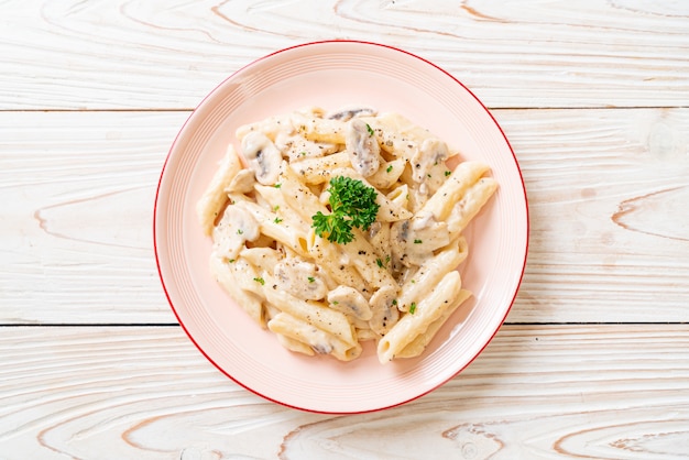 penne pasta carbonara cream sauce with mushroom