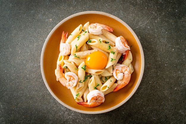 Penne pasta white cream sauce with shrimps and egg