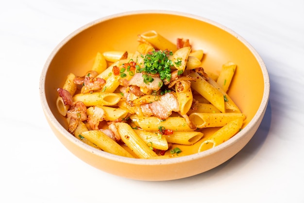 Penne pasta with garlic chili bacon