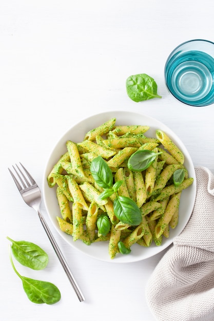 Penne pasta with spinach basil pesto sauce