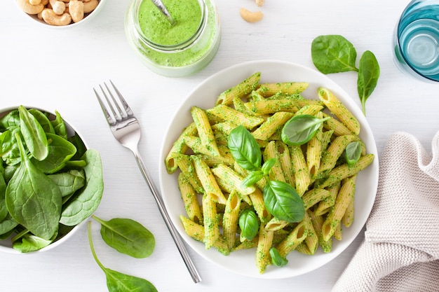 Penne pasta with spinach basil pesto sauce