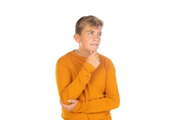 Pensive teenager in orange tshirt