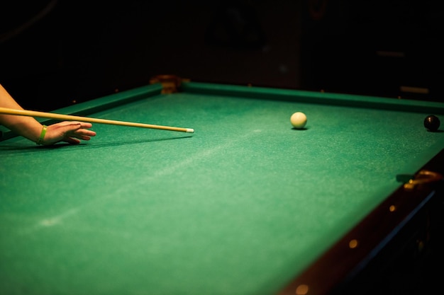 People are playing billiards Wooden billiard holes Billiards gamble