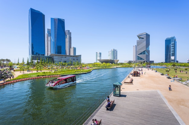 People are riding a tourist boat in summer of Korea at Central Park in Songdo District, Incheon South Korea.