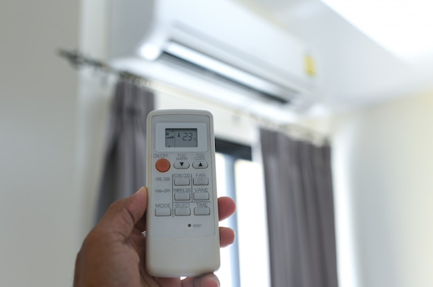 People are using the remote control air conditioner.