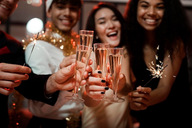 People cheering at a new year's eve party