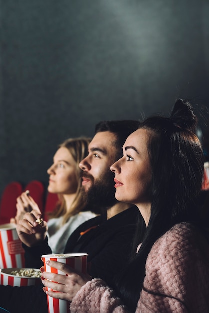 People enjoying film in cinema