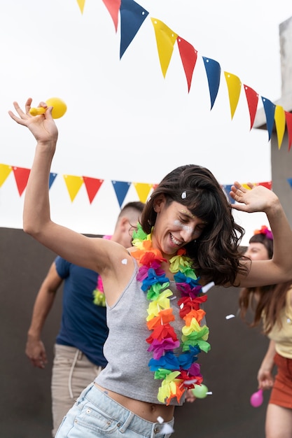 People having fun and celebrating carnival