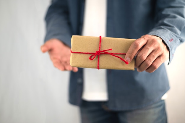 People holding gift box, new year gift box, Christmas gift box ,copy space. Christmas, hew year, birthday concept.