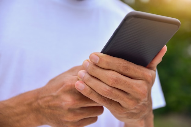 People holding mobile smart phone for using shopping online by internet network and communication