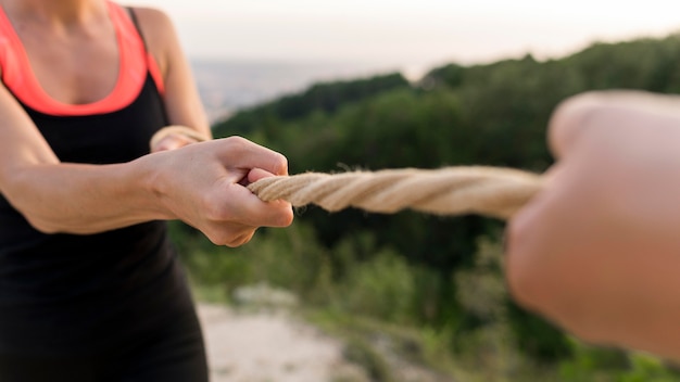 People holding tight a rope