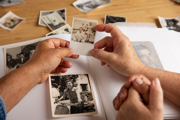 People looking over picture album