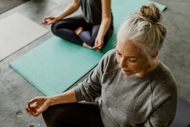 People meditating in a yoga class