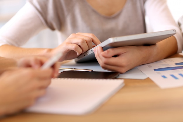 people in office using digital tablet