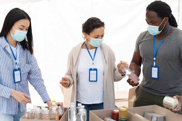 People preparing a foodbank for poor people