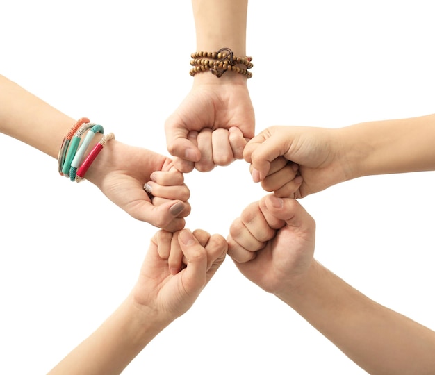 People putting hands together as symbol of unity on white background