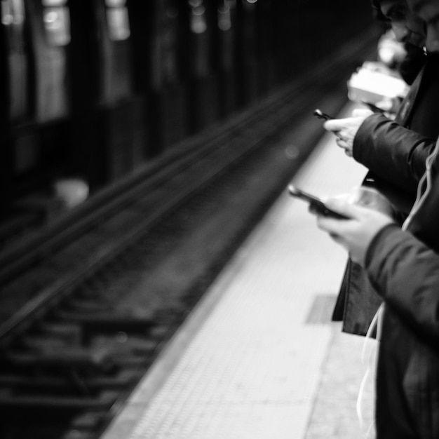 People on railroad station platform