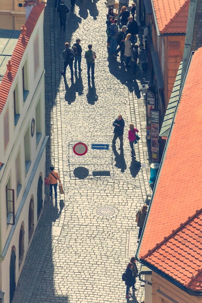 People on the street in the beautiful old city Toned