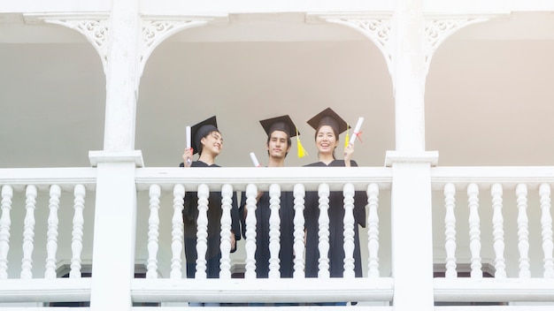 people students with the graduation gowns 