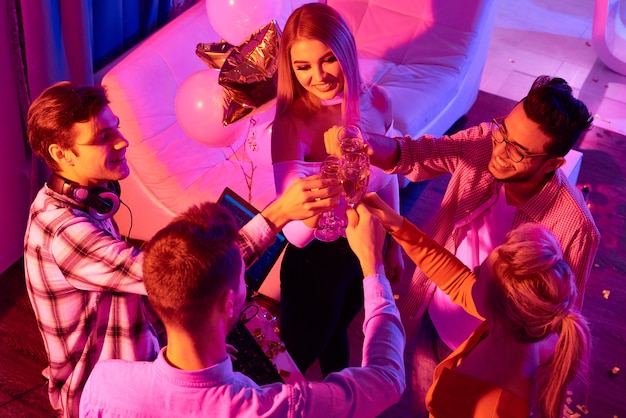 People Toasting with Champagne at Party