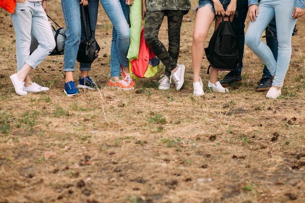 People tourism shoes advertisement concept. Traveler happiness and hiking equipment.