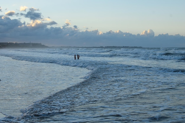 People tourists swim in the sea in summer. happy holidays on the seaside.