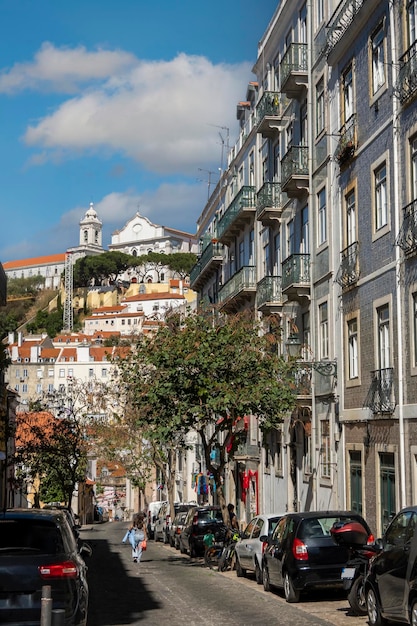 People visit the Mouraria district in Lisbon