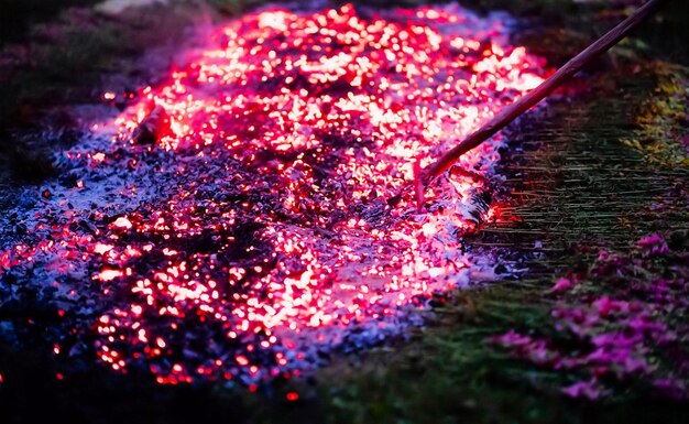 People walk on coals fire ritual shaman festival