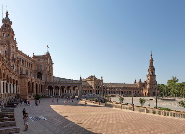 People walking in the Plaza de Espana in Seville Andalusia Spain