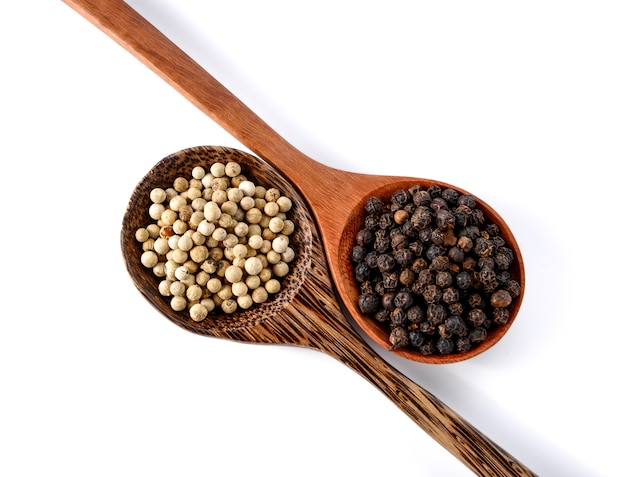 Pepper seeds on white background.