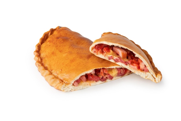 Pepperoni and cheese filled calzone pizza isolated on a white background