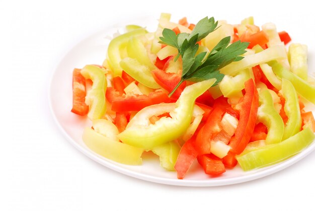 Peppers and parsley on a white background