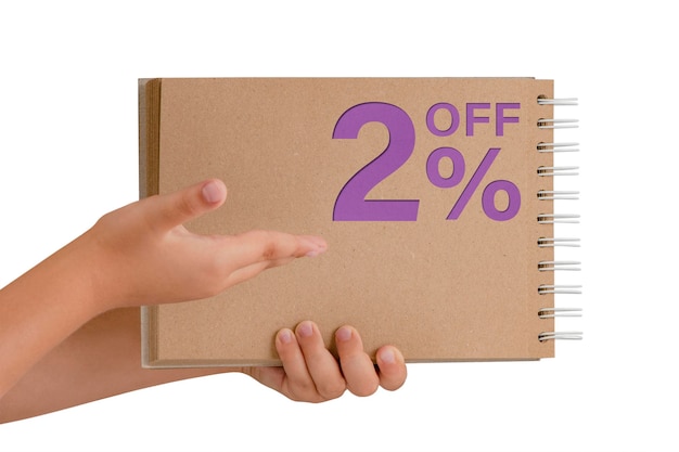 Percent discount on isolate notepad from recycled paper in the hands of a child with text sale up to