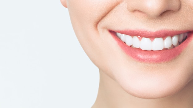 Perfect healthy teeth smile of a young woman.