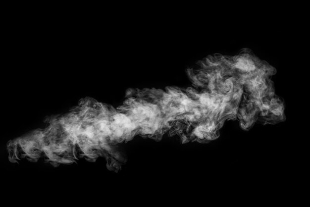 Perfect mystical curly white steam or smoke isolated on black background Abstract background fog or smog design element layout for collages