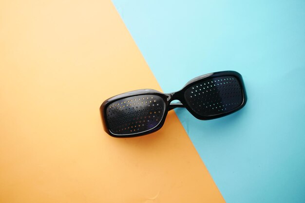 Perforation glasses with holes for training vision