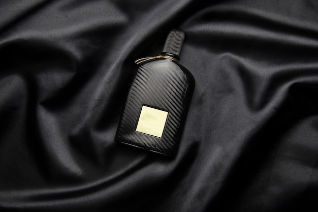 Perfume on black fabric