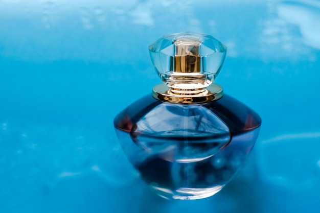 Photo perfume bottle under blue water fresh sea coastal scent as glamour fragrance and eau de parfum product as holiday gift luxury beauty spa brand present