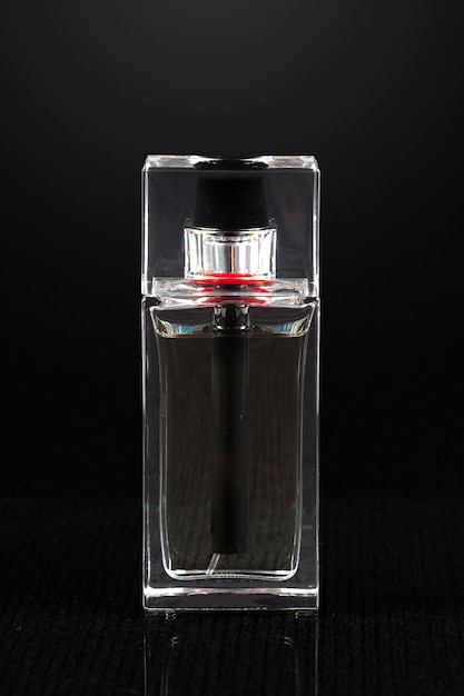 Perfume bottle on dark 