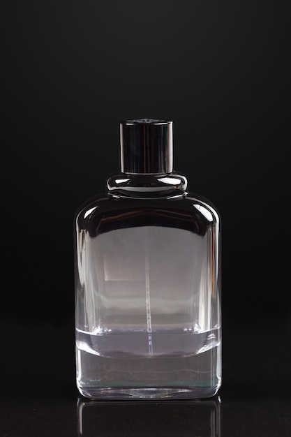 Perfume bottle on dark 