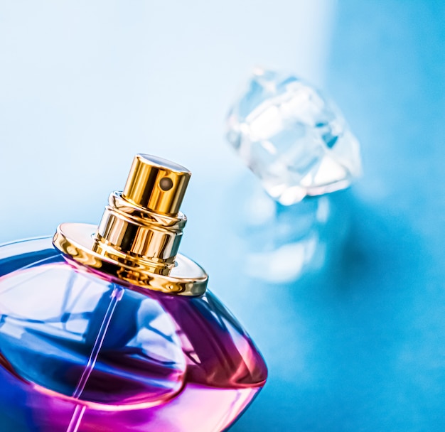 Perfume bottle on glossy background sweet floral scent glamour fragrance and eau de parfum as holida...