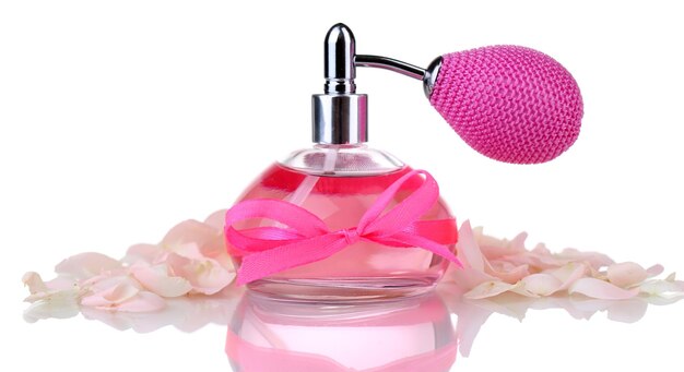 Perfume bottle with petals isolated on white