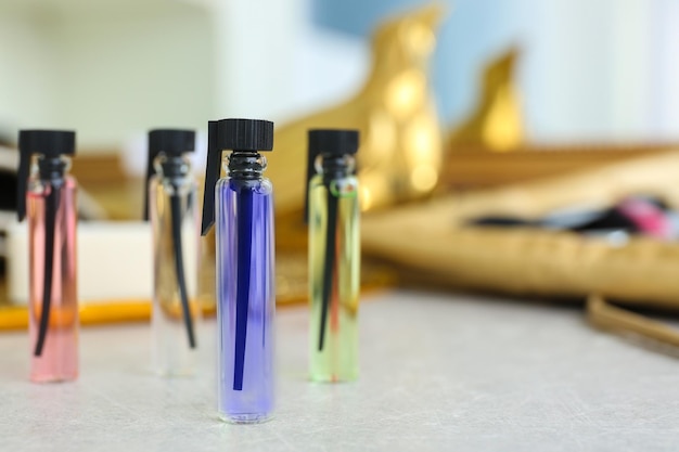 Perfume samples on blurred background