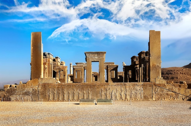 Persepolis is the capital of the ancient Achaemenid kingdom Sight of Iran Ancient Persia Blue sky and clouds background