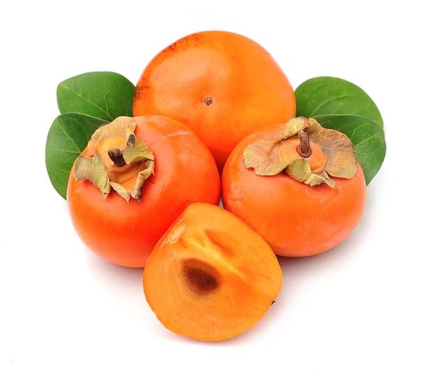 Persimmon with leaves isolated.