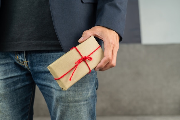 Person holding gift box, new year gift box, Christmas gift box ,copy space. Christmas, hew year, birthday concept.